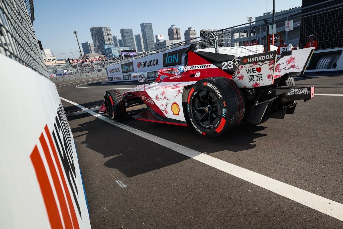 Buildings in Tokyo and a Nissan Gen3 car in special wrap.jpg
