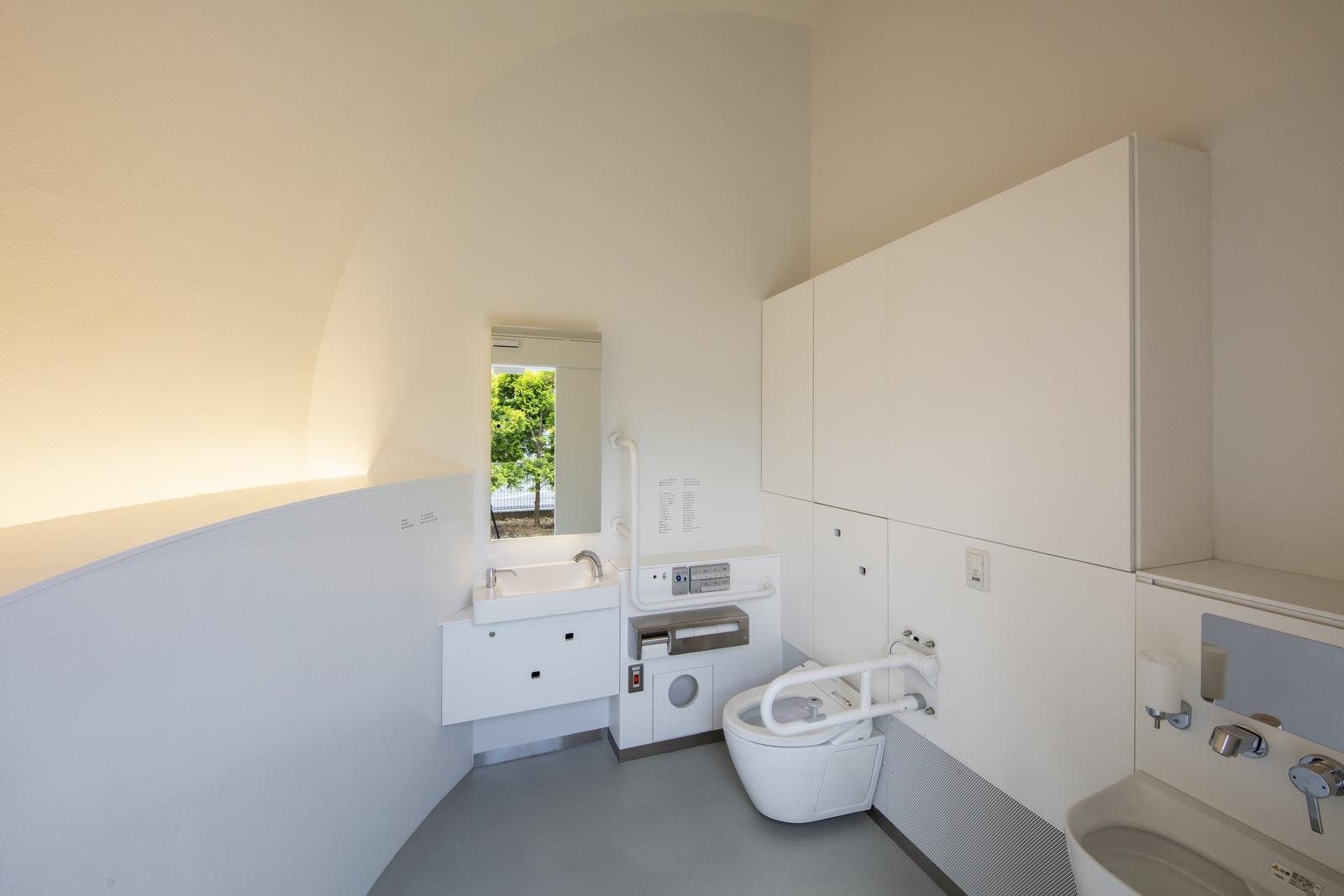 Inside the universal toilet. Microphones were installed inside the toilet for voice command.