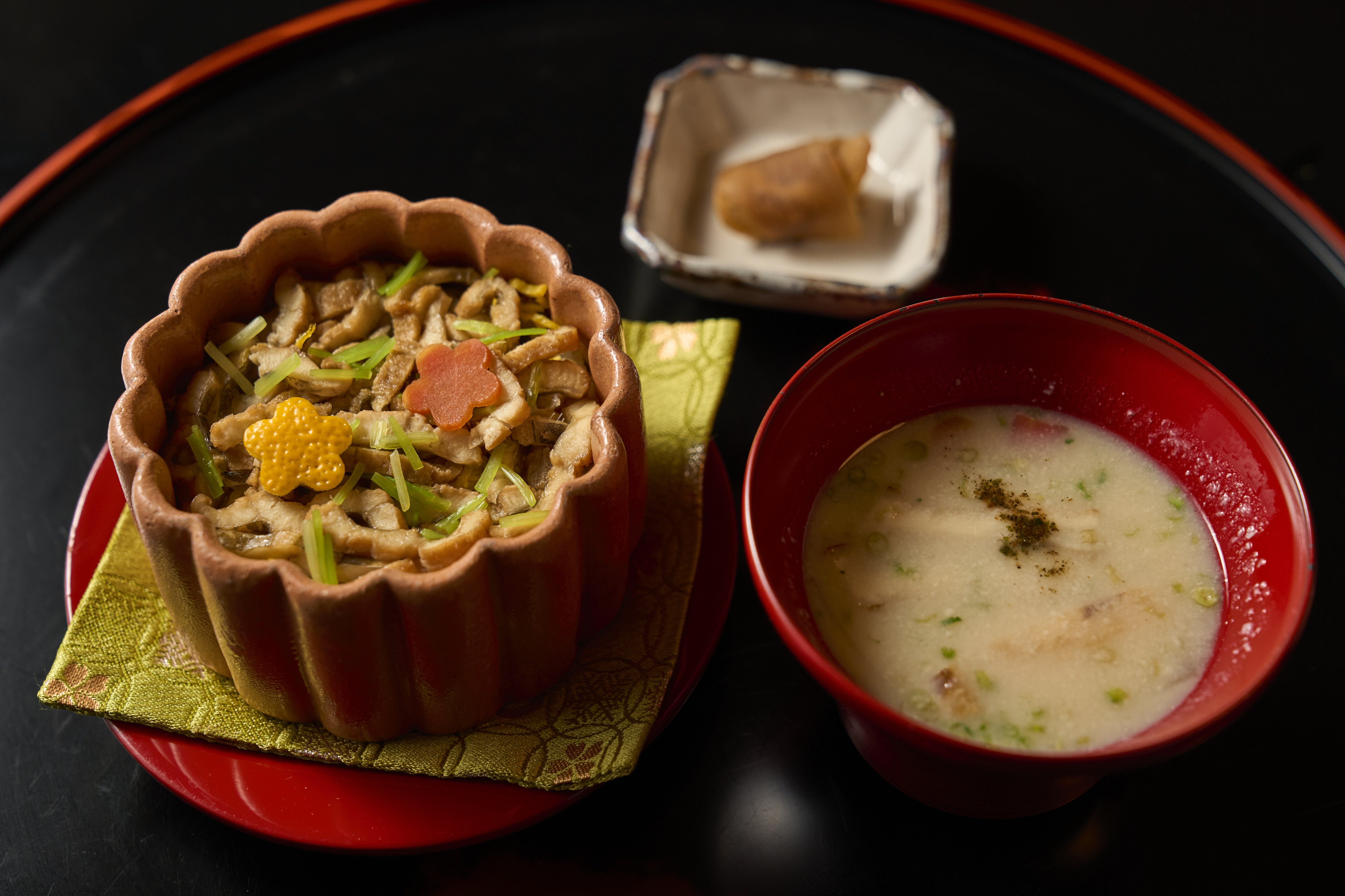 The gohan and tomewan dishes: steamed sushi with conger eel and egg strips