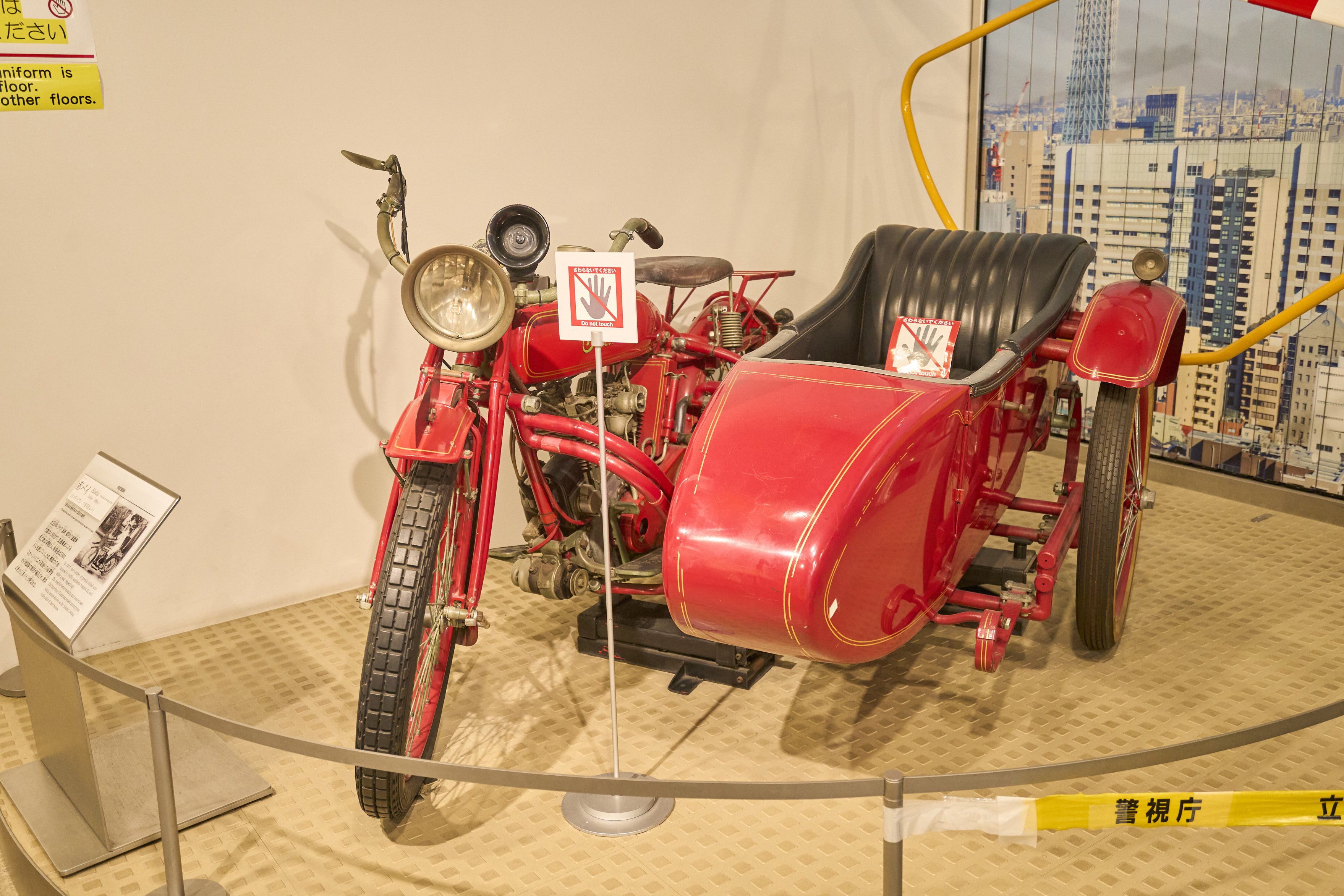 A motorcycle combo of the same model as the original red police motorcycles.