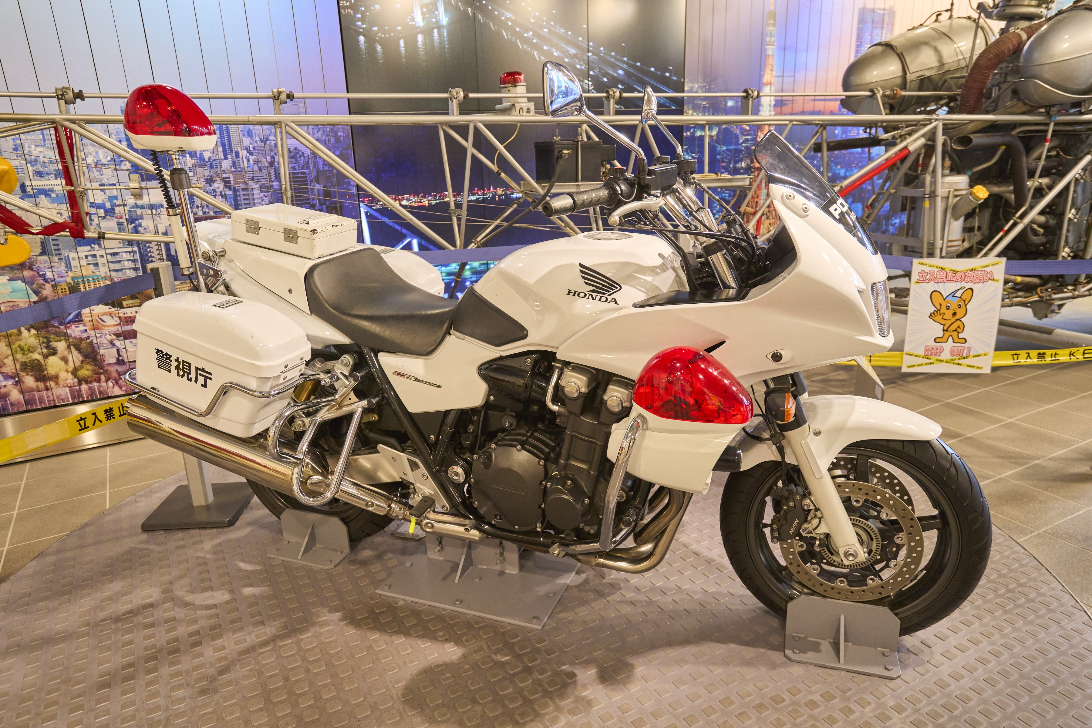 Police motorcycles were originally red but were later repainted white like their Western counterparts to stand out.