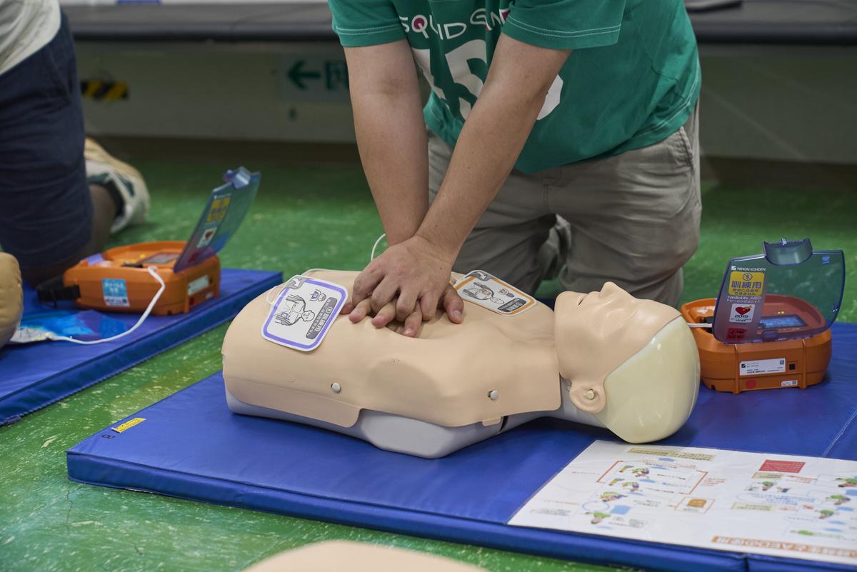 Participants learn proper CPR technique.
