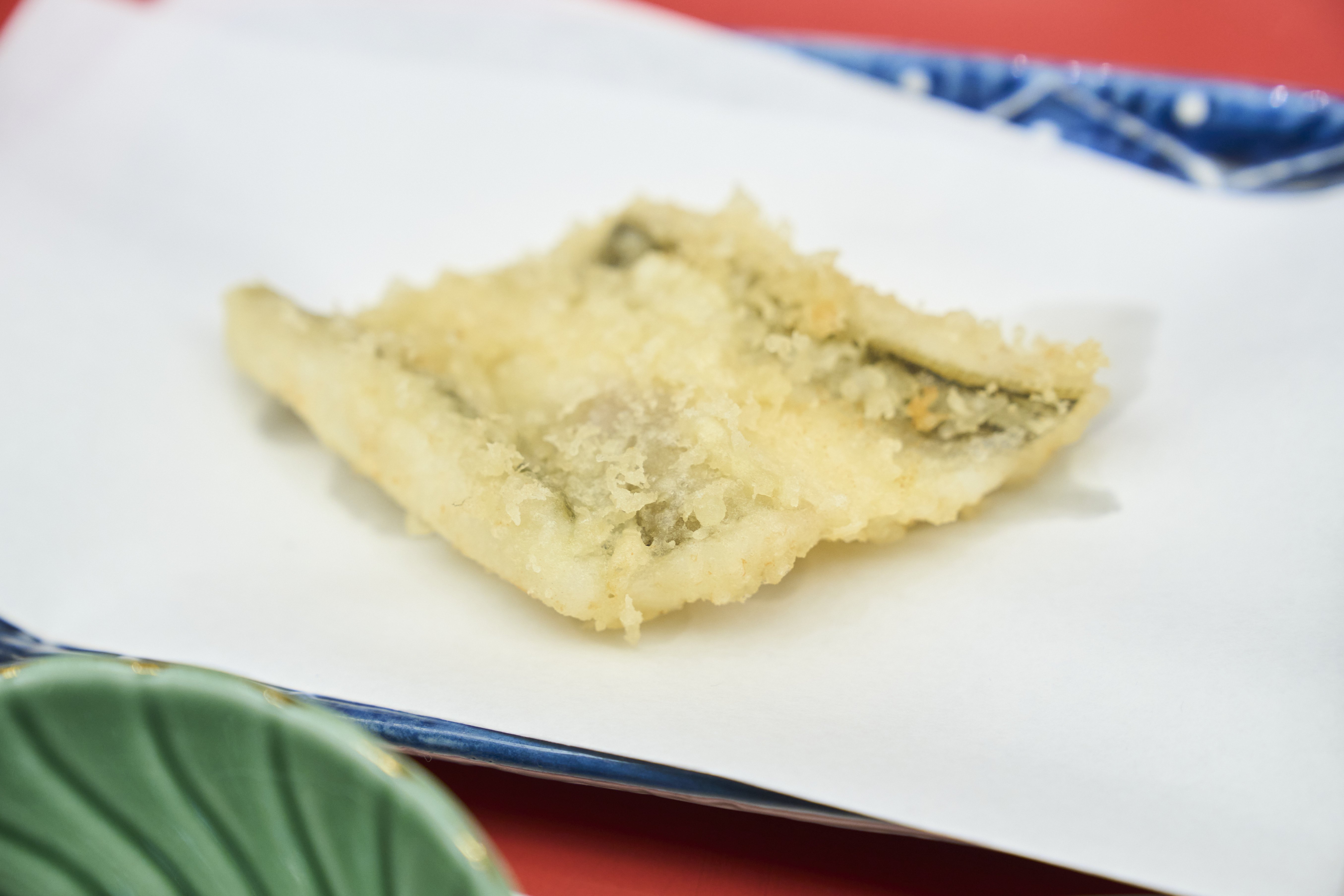 Anago eel tempura is a highlight of the meal.