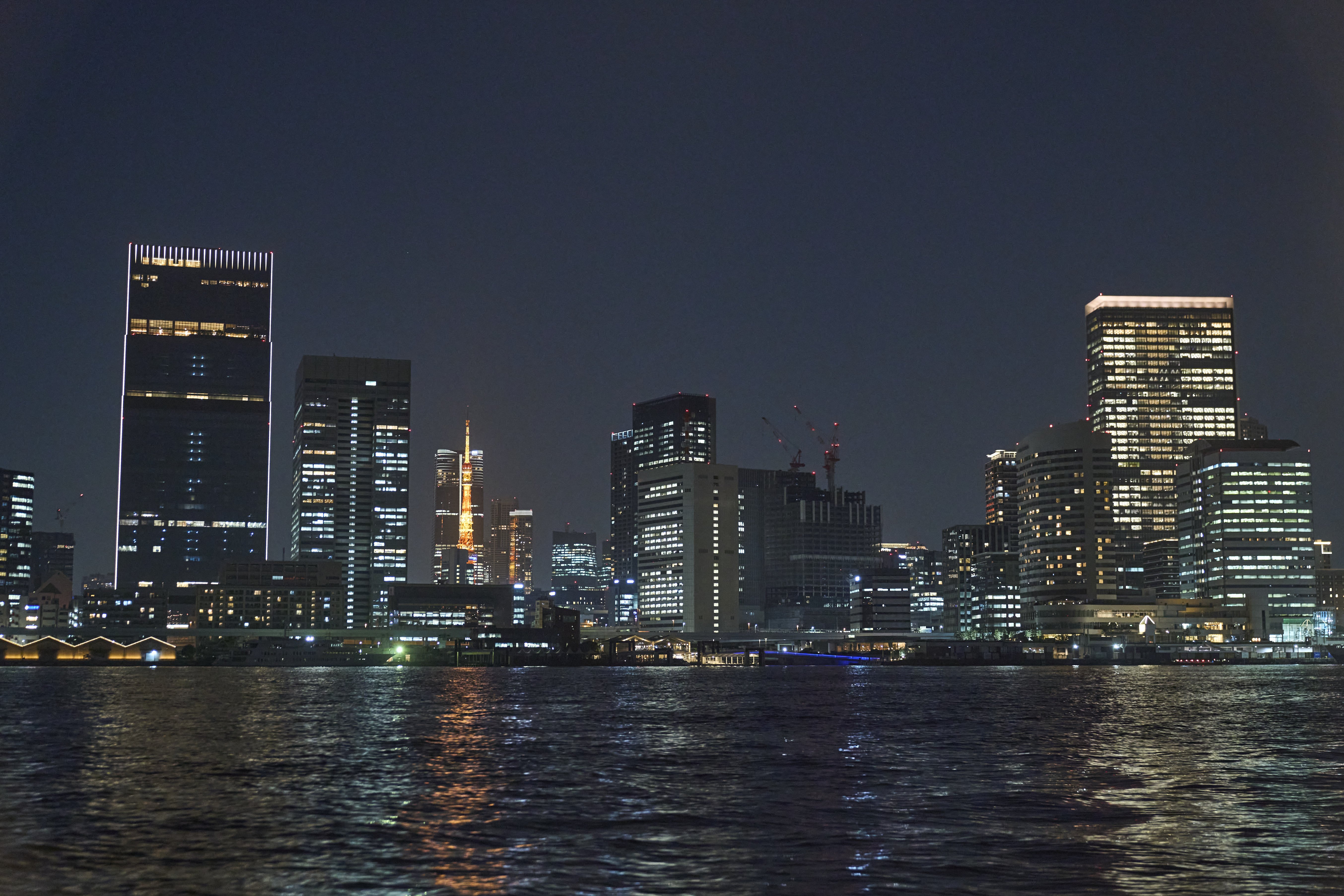 The lights of Tokyo's Shibaura and Shiodome neighborhoods.