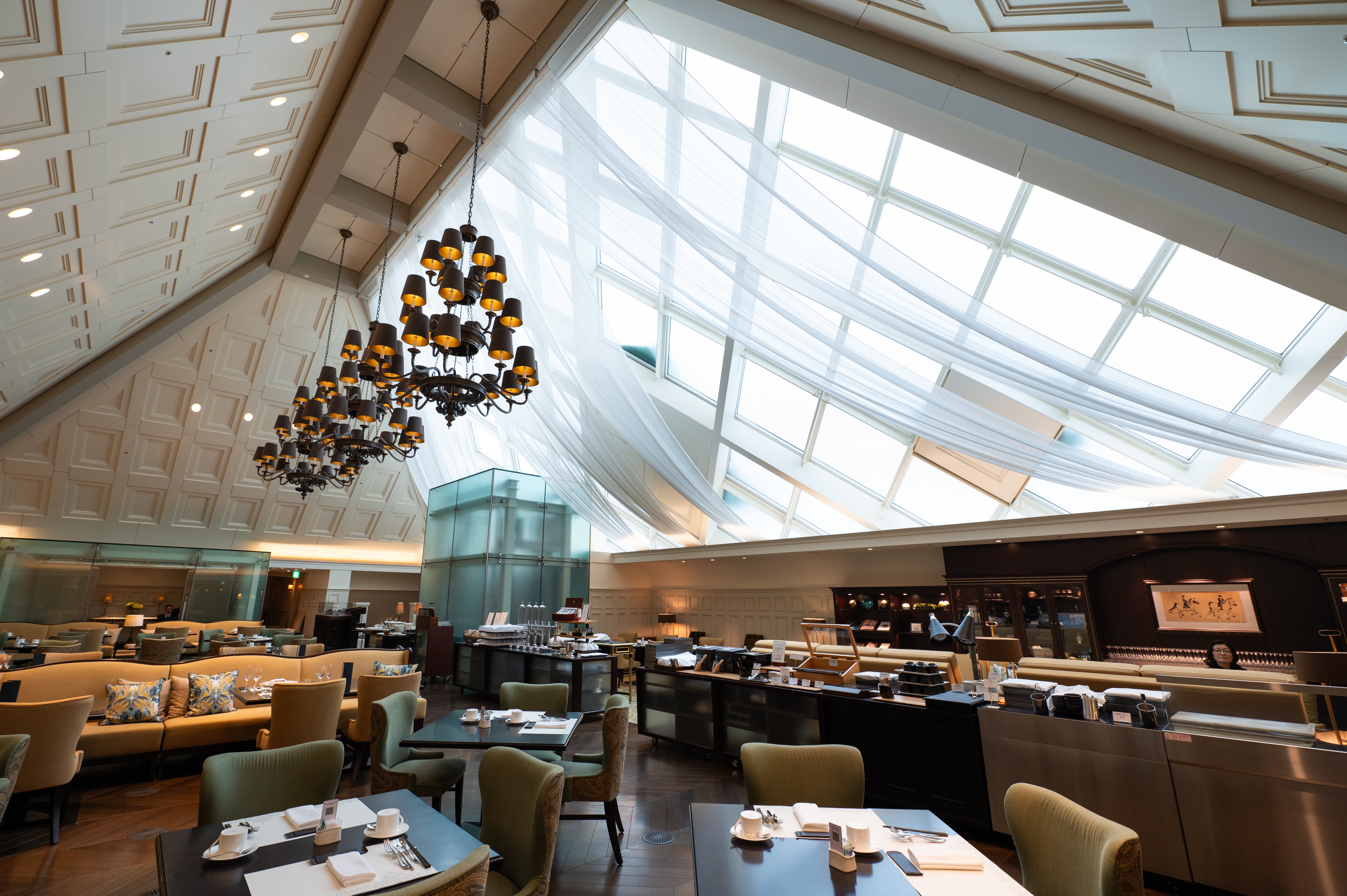 Bright light shines through skylights in the guest lounge, 