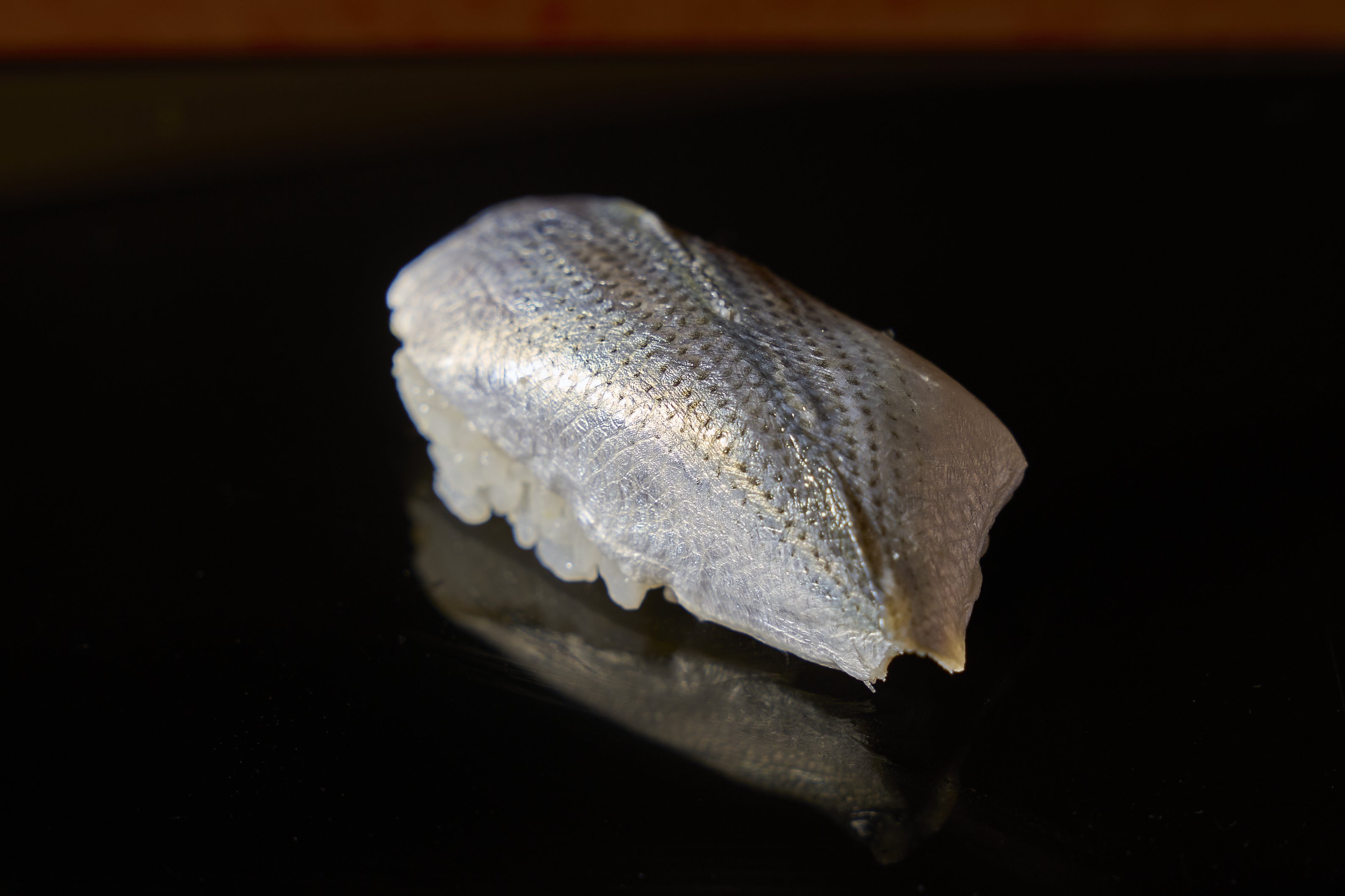 To be considered a full-fledged sushi chef, one must prepare <i>kohada</i> (gizzard shad) well.