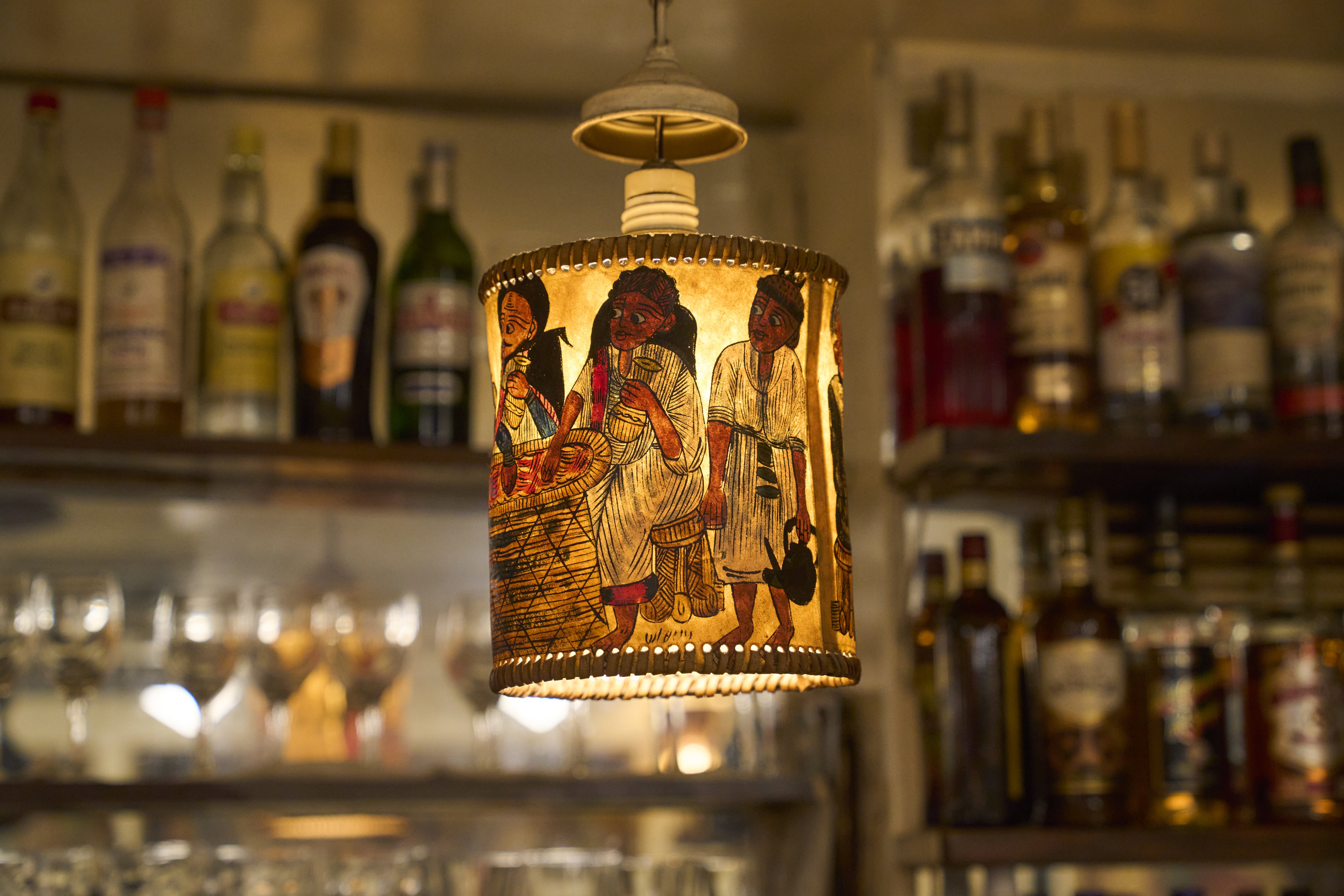 Lamps and decorations create an exotic atmosphere.