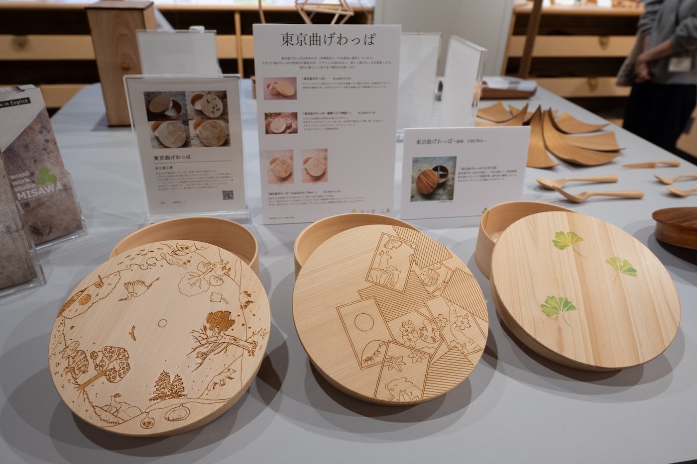 Decorated bento boxes made from wood.