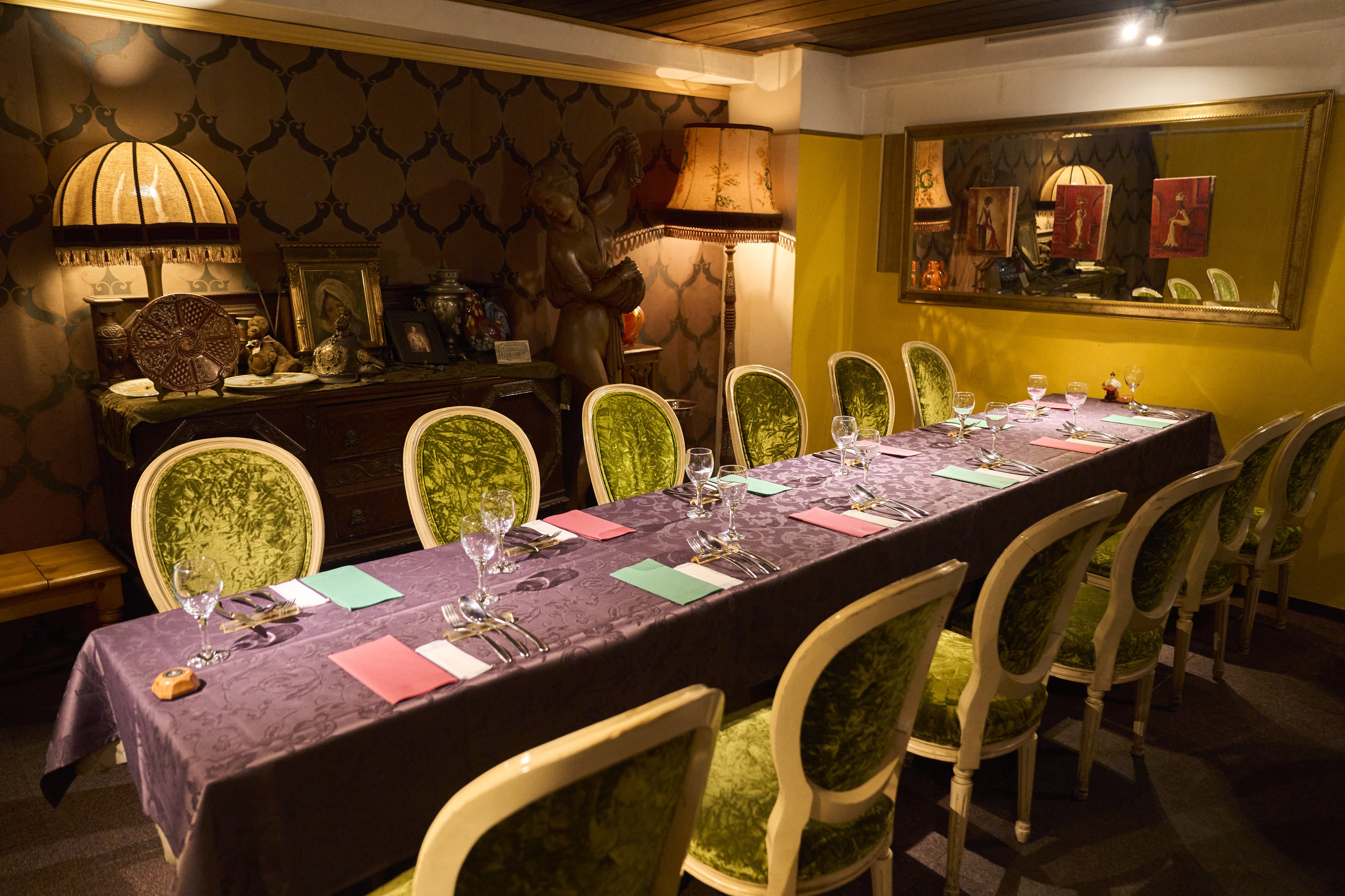 The upper floor is elegantly furnished, ideal for formal dinners or client meetings.