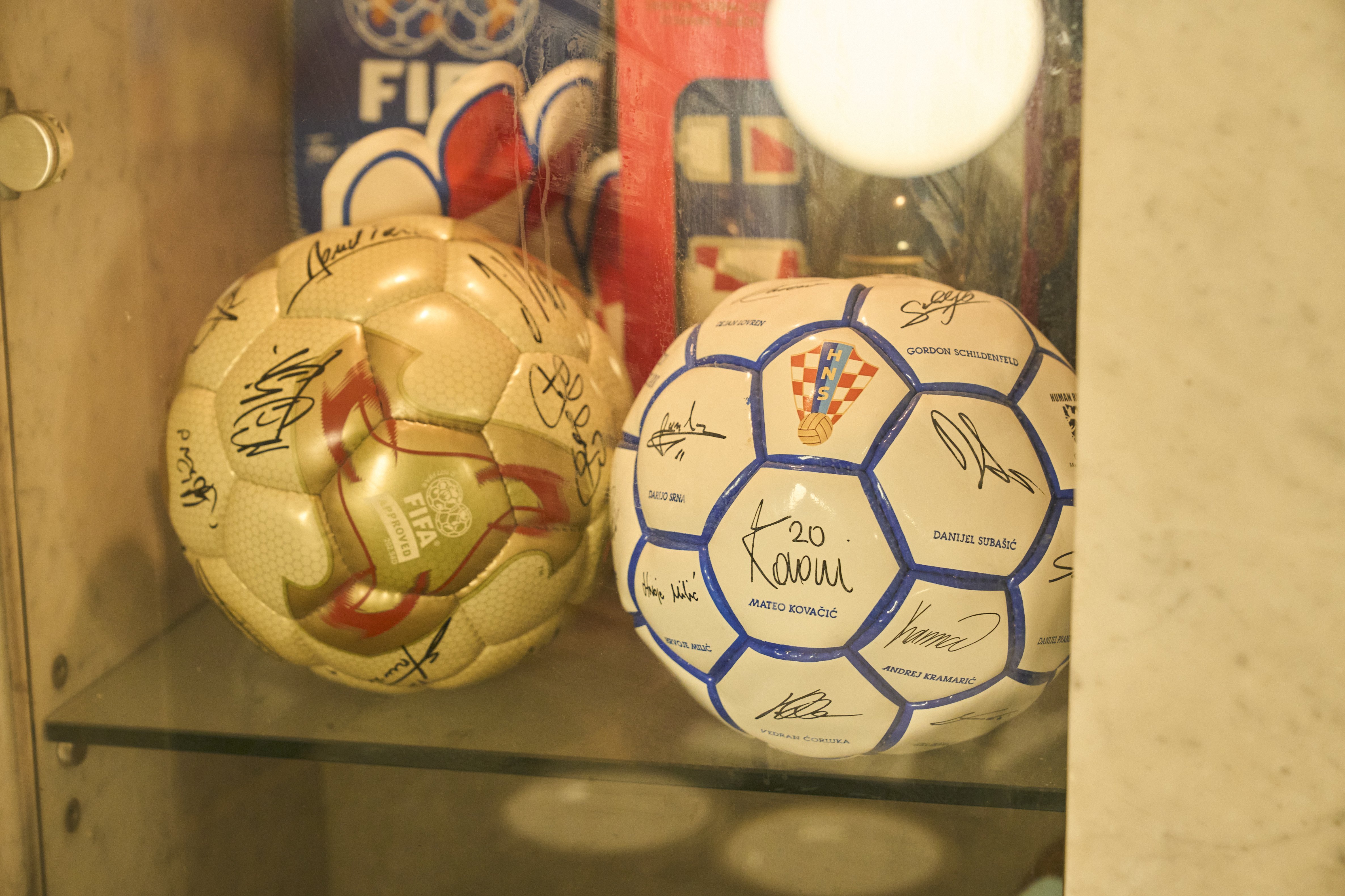 On display are commemorative footballs signed by Croatian players.