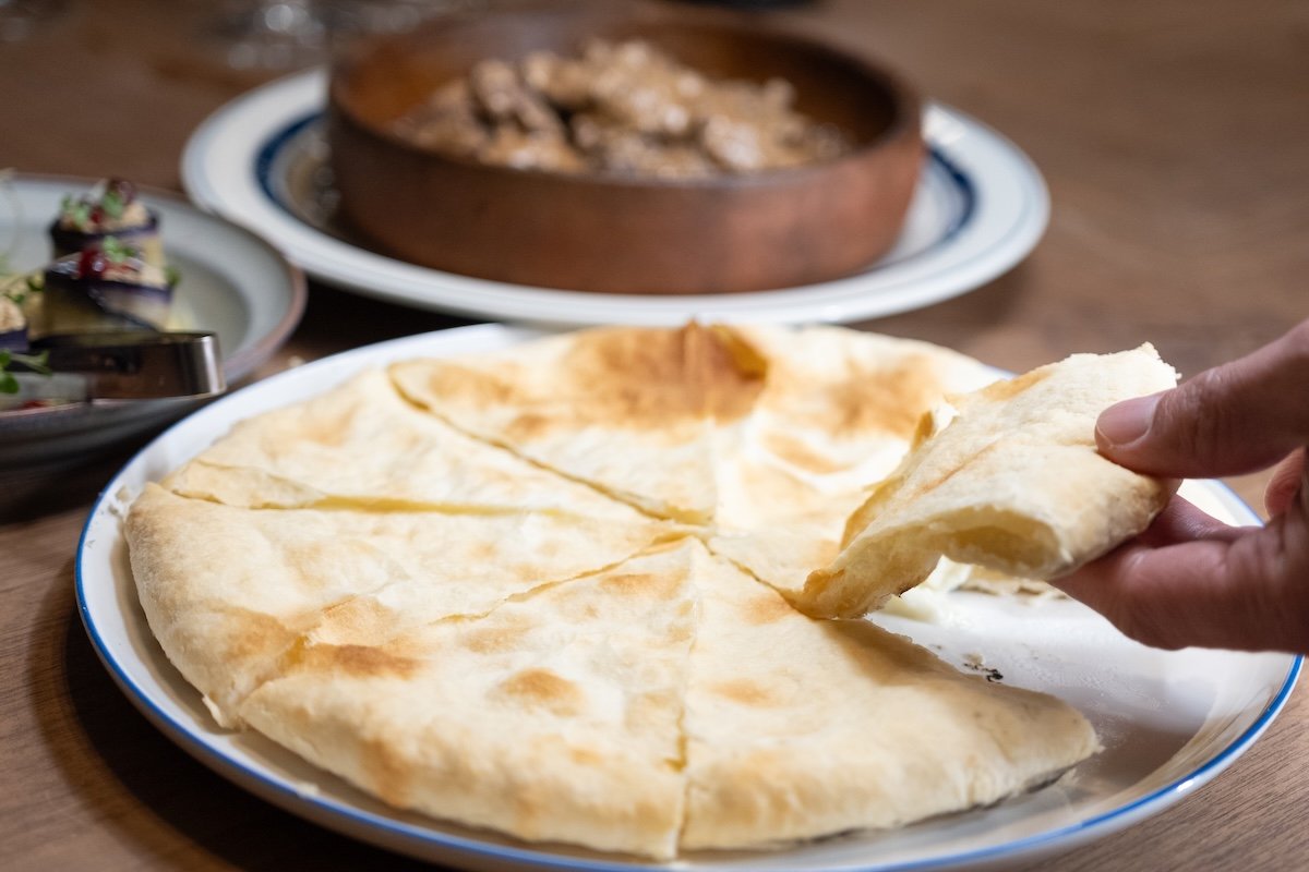 Khachapuri, softer than it appears, made with Imeruli cheese developed in collaboration with a Japanese producer.