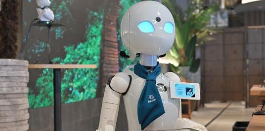 An Experimental Café in Nihombashi where Avatar Robots Facilitate Human Connections