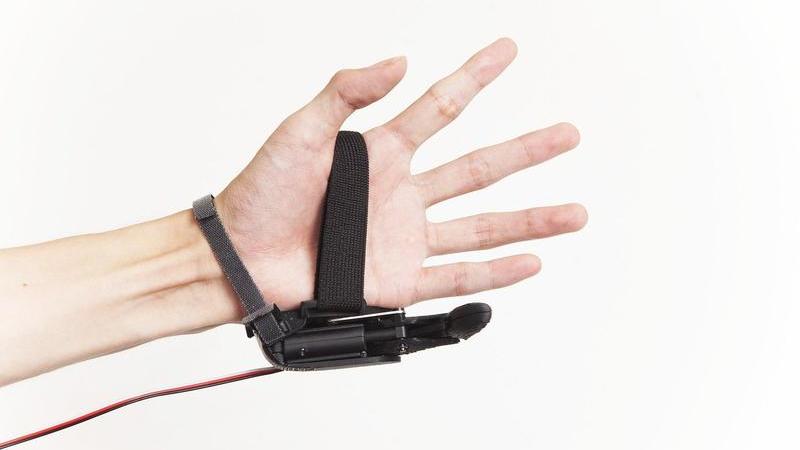 Tokyo Evolving: How an Independently Controlled "Sixth Finger" Can Change One's Sense of Self